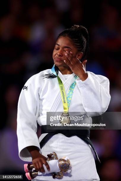 Gold medallist Michaela Whitebooi of Team South Africa celebrates during the Judo Women - 48 kg medal ceremony on day four of the Birmingham 2022...