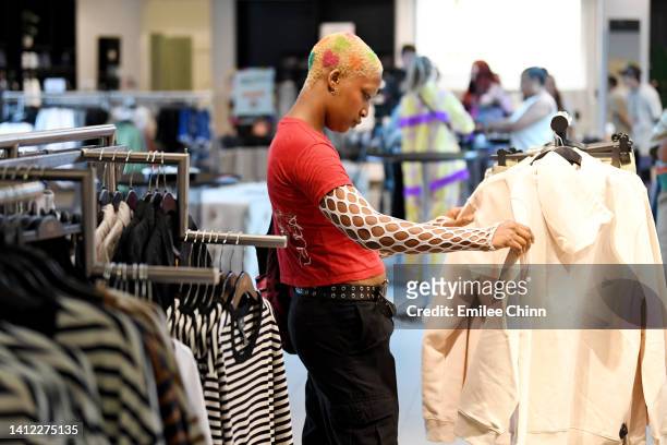 Guest shops during the "Fresh And Fabulous For Fall" event presented by H&M and The Marsha P. Johnson Institute at Polaris Fashion Place on August...