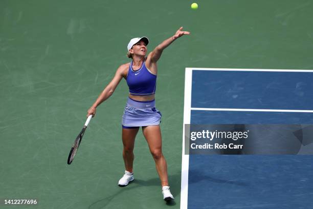 Simona Halep of Romania serves to Cristina Bucsa of Spain during Day 3 of the Citi Open at Rock Creek Tennis Center on August 01, 2022 in Washington,...