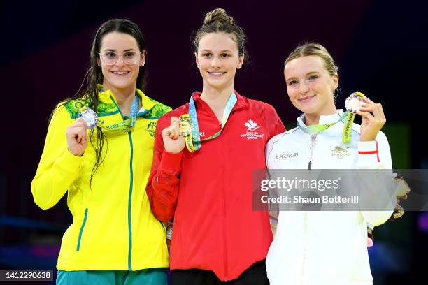 Silver medalist, Kaylee McKeown of Team Australia, Gold medalist, Summer McIntosh of Team Canada and Bronze medalist, Abbie Wood of Team England pose...