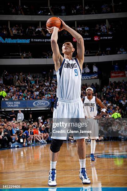 Yi Jianlian of the Dallas Mavericks takes a foul shot against the New York Knicks on March 6, 2012 at the American Airlines Center in Dallas, Texas....
