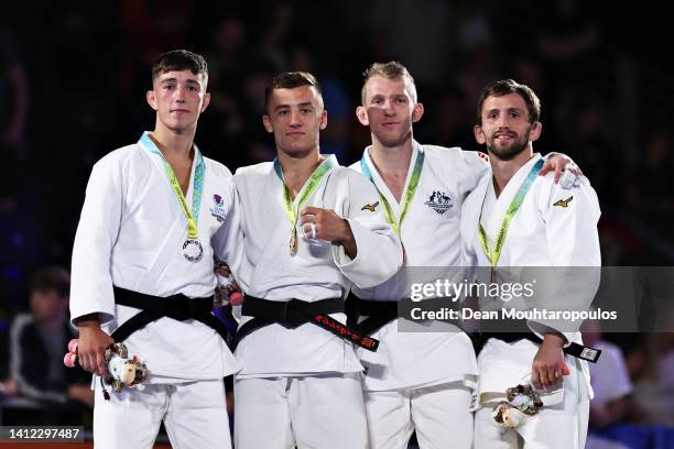 Silver medalist Finlay Allan of Team Scotland, Gold medalist Georgios Balarjishvili of Team Cyprus, Bronze medalist 1 Nathan Katz of Team New Zealand...