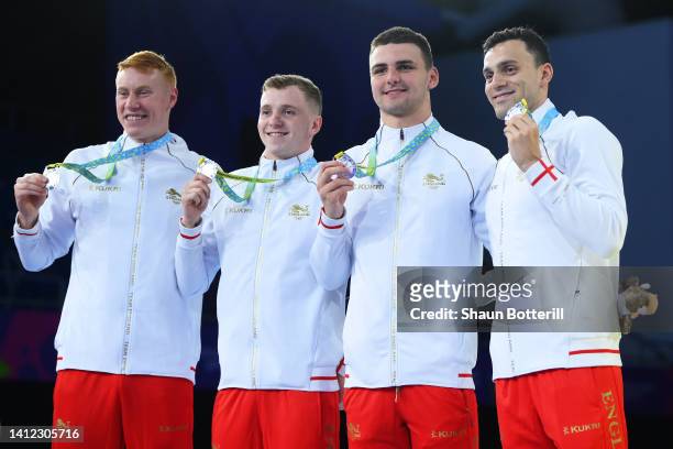 Silver medalists, James Guy, Jacob Whittle, Joe Litchfield and Tom Dean of Team England pose with their medals for the Men's 4 x 200m Freestyle Relay...