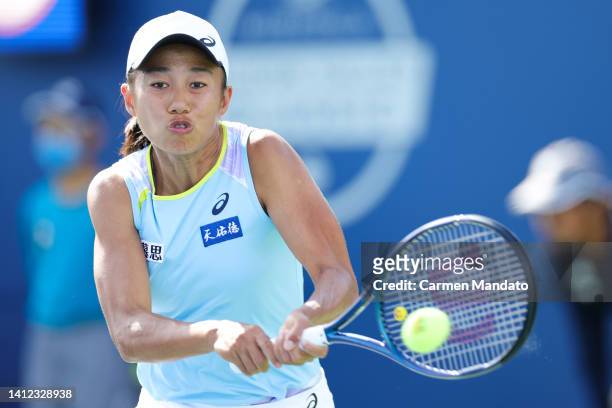 Shuai Zhang of China returns a shot from Madison Keys during the Mubadala Silicon Valley Classic, part of the Hologic WTA Tour, at Spartan Tennis...