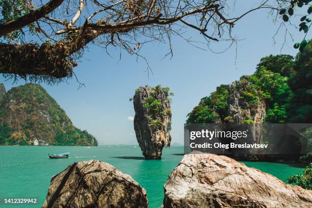 beautiful view of khao phing kan island in thailand, in phang nga bay northeast of phuket - james bond island stock pictures, royalty-free photos & images