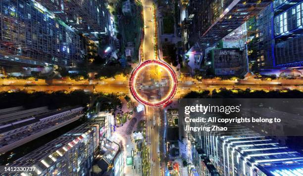 aerial photography of night view of circular overpass in new downtown 
 of chengdu - calota - fotografias e filmes do acervo