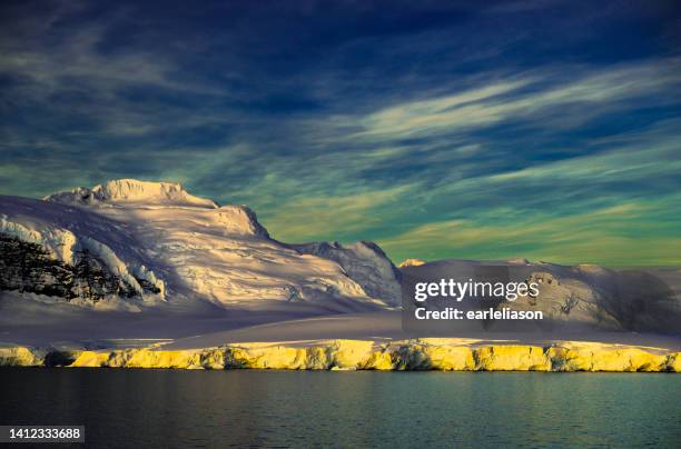 twilight in antarctica - antarctica sunset stock pictures, royalty-free photos & images