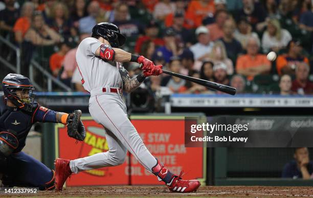 Jarren Duran of the Boston Red Sox doubles in a run in the third inning against the Houston Astros at Minute Maid Park on August 01, 2022 in Houston,...