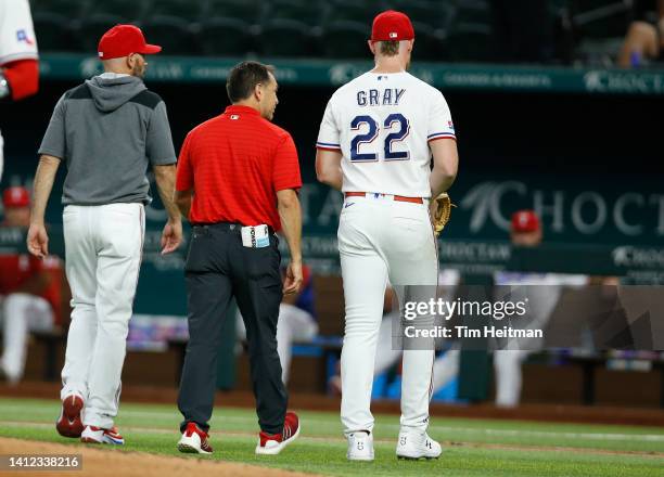 Jon Gray of the Texas Rangers leaves the game with an apparent injury in the second inning against the Baltimore Orioles at Globe Life Field on...