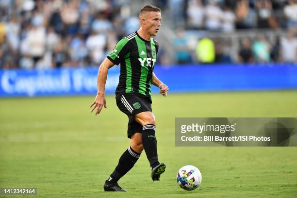 Alexander Ring of Austin FC runs with the ball during a game between Austin FC and Sporting Kansas City at Children's Mercy Park on July 30, 2022 in...