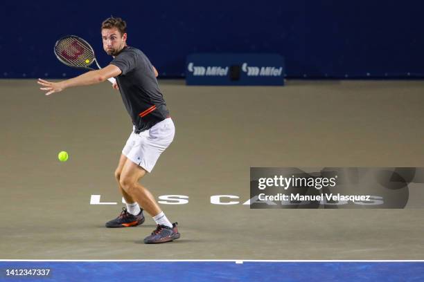Quentin Halys of France hits a forehand against Ricardas Berankis of Lituania as part of Day 1 of the Mifel ATP Los Cabos Open 2022 at Cabo Sports...