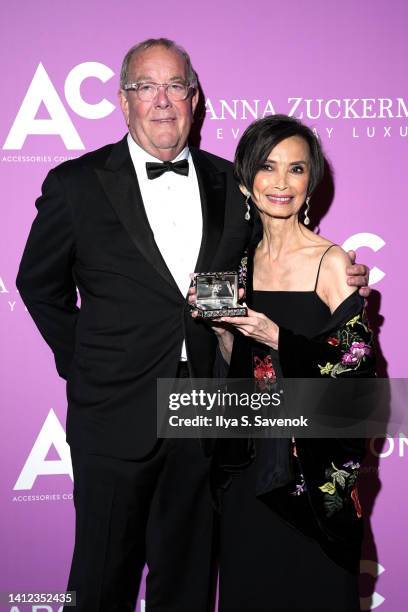 Ron Frasch and Josie Natori pose with an ACE Award at the 26th Annual ACE Awards at Cipriani 42nd Street on August 01, 2022 in New York City.