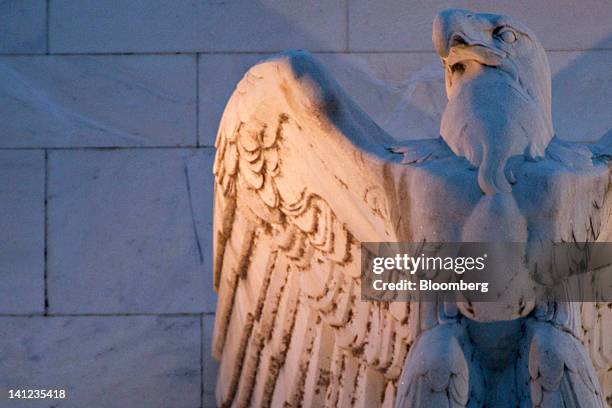 Detail of the Marriner S. Eccles Federal Reserve building is photographed in Washington, D.C., U.S., on Tuesday, March 13, 2012. Federal Reserve...