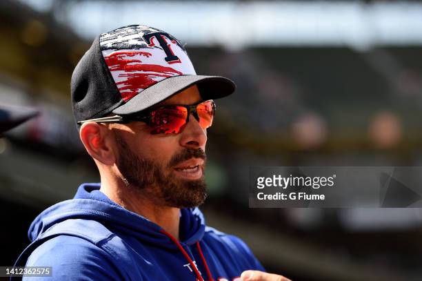 Manager Chris Woodward of the Texas Rangers watches the game against the Baltimore Orioles at Oriole Park at Camden Yards on July 04, 2022 in...