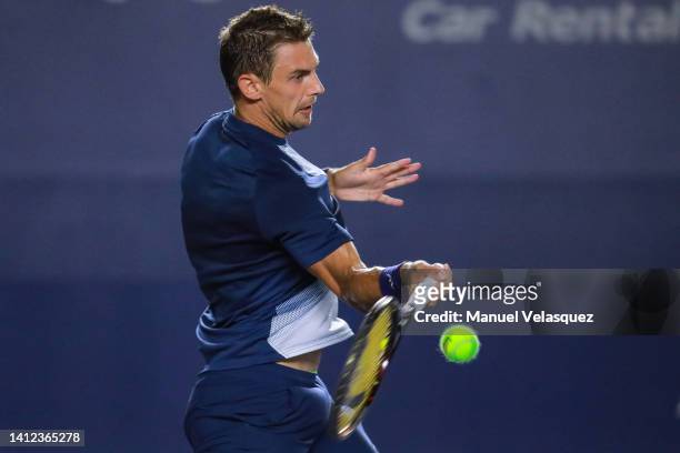 Henri Laaksonen from Switzerland returns the ball against Max Purcell of Australia as part of Day 1 of the Mifel ATP Los Cabos Open 2022 at Cabo...
