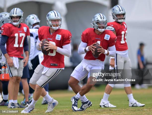 Quarterbacks Cooper Rush and Dak Prescott of the Dallas Cowboys participate during training camp at River Ridge Fields on August 1, 2022 in Oxnard,...