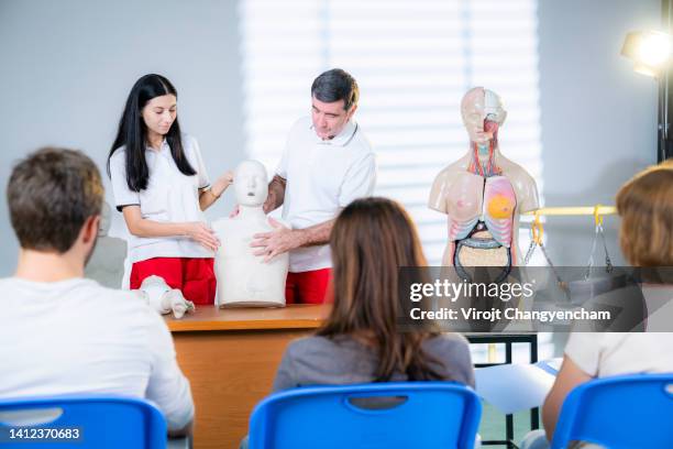 demonstrates cpr training - bust sculpture stock pictures, royalty-free photos & images