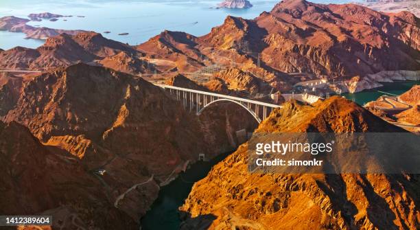 hoover dam and lake mead in background - nevada stock pictures, royalty-free photos & images
