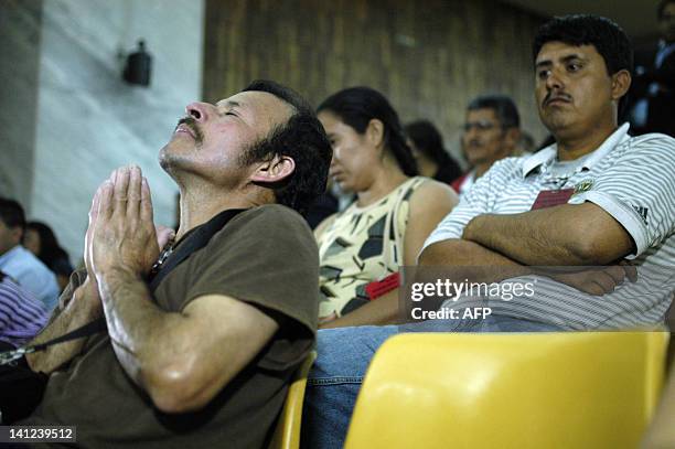 Man whose relatives were assassinated at Las Dos Erres village in 1982 gestures while listening the sentence to former Army Special Forces member...
