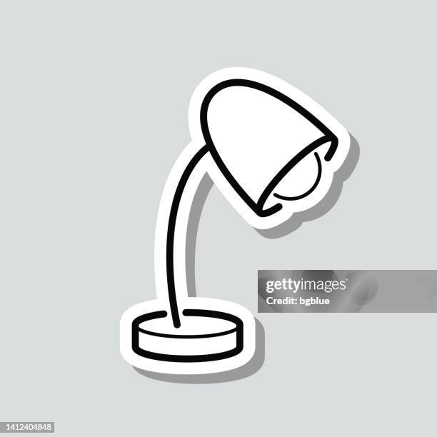 desk lamp. icon sticker on gray background - light switch stock illustrations