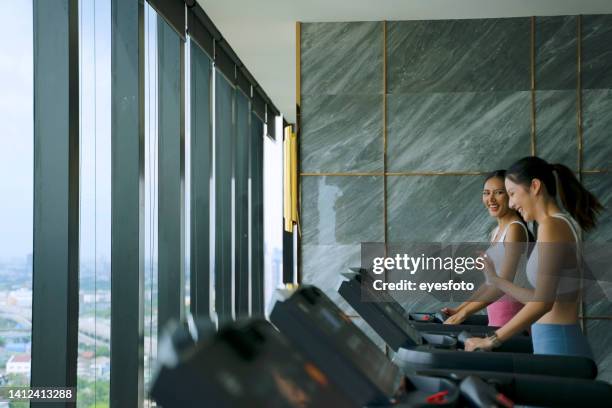 pretty women are exercising at sport club. - country club stock pictures, royalty-free photos & images