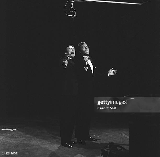 Aired -- Pictured: Actors Burt Lancaster and Kirk Douglas during a pre-taped performance of "It's Alright With Us" for the 31st Annual Academy Awards...