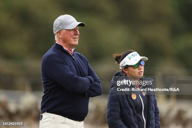 Martin Slumbers, Chief Executive of The R&A interacts with Atthaya Thitikul of Thailand during the Pro-Am prior to the AIG Women's Open at Muirfield...