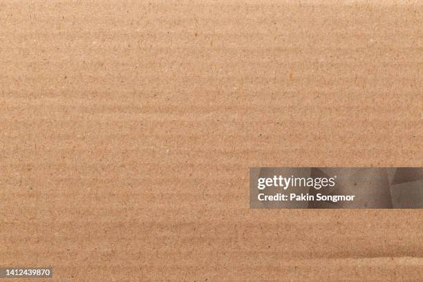 brown paper sheet texture cardboard background. - paper board stock-fotos und bilder