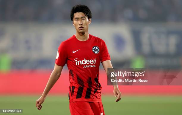 Daichi Kamada of Eintracht Frankfurt looks on during the DFB Cup first round match between 1. FC Magdeburg and Eintracht Frankfurt at MDCC Arena on...