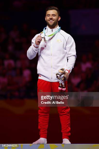 Silver medalist Giarnni Regini-Moran of Team England poses for a photo during the medal ceremony for Men's Vault Final on day five of the Birmingham...