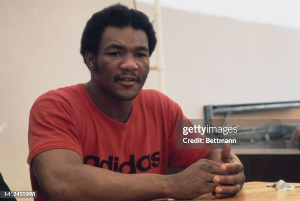 World Heavyweight champion George Foreman holds press conference the morning after beating Joe Frazier.