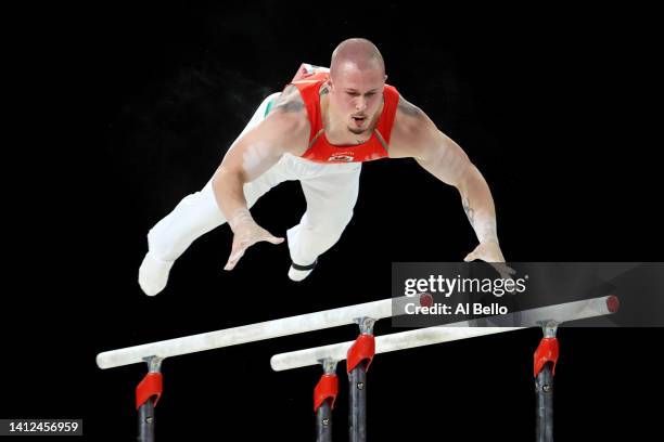 Brinn Bevan of Team Wales competes during Men's Parallel Bars Final on day five of the Birmingham 2022 Commonwealth Games at Arena Birmingham on...