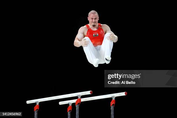 Brinn Bevan of Team Wales competes during Men's Parallel Bars Final on day five of the Birmingham 2022 Commonwealth Games at Arena Birmingham on...