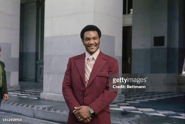 Close-up of boxer George Foreman in suit. World Heavyweight Champion.