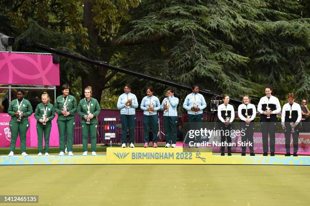 Silver medalists Thabelo Muvhango, Bridget Calitz, Esme Kruger and Johanna Snyman of Team South Africa, Gold medalist Lovely Choubey, Pinki,...