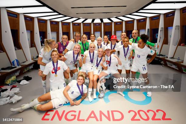 The England Team celebrate in the dressing room following victory in the UEFA Women's Euro 2022 final match between England and Germany at Wembley...