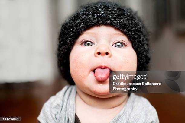 portrait of baby girl - tongue stock pictures, royalty-free photos & images