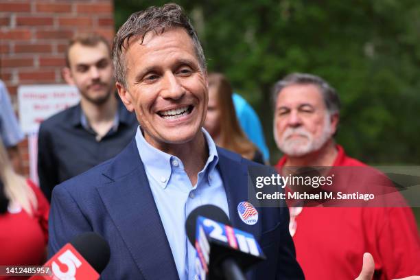 Former Missouri Gov. And Missouri Senate Candidate Eric Greitens speaks with reporters after voting during Primary Election day at the Village Hall...