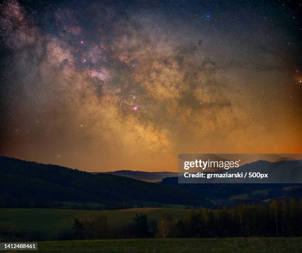 scenic view of star field against sky at night - light pollution stock pictures, royalty-free photos & images