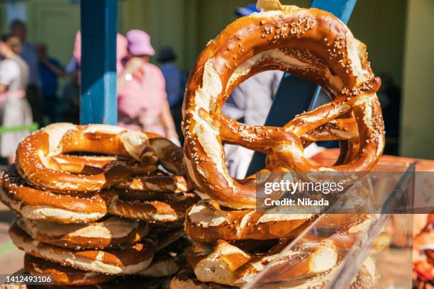 bavarian pretzel for sale, beer fest munich - short phrase stock pictures, royalty-free photos & images