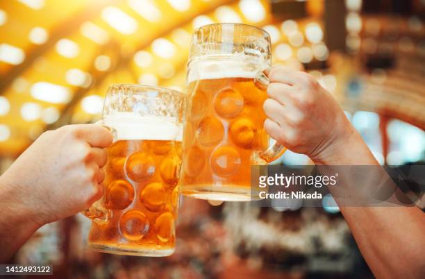 beer at beer fest, munich, germany - outubro imagens e fotografias de stock