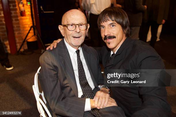 Former Chairman of Warner Records Mo Ostin poses for a portrait with Anthony Kiedis of the Red Hot Chili Peppers on September 9, 2018 in Los Angeles,...