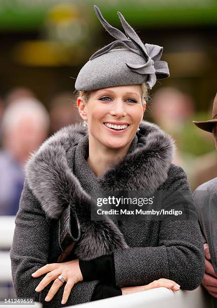 Zara Phillips watches the racing as she attends day 1 of the Cheltenham Horse Racing Festival on March 13, 2012 in Cheltenham, England.