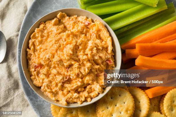 directly above shot of food in bowl on table - pimientos stock-fotos und bilder