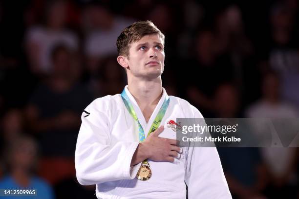 Gold Medallist Daniel Powell of Team England celebrates during the Men's Judo -73kg Medal Ceremony on day five of the Birmingham 2022 Commonwealth...