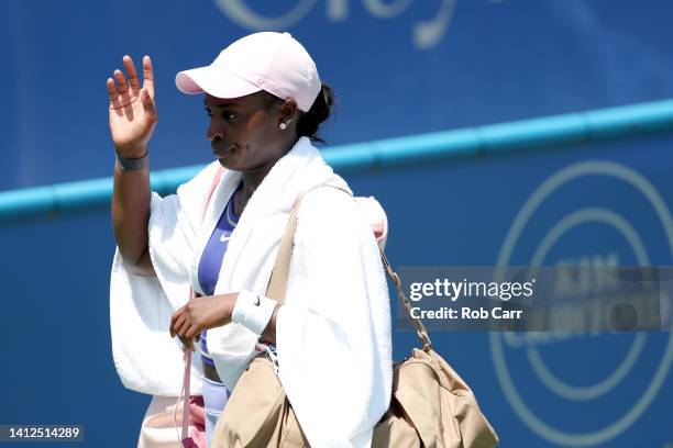 Sloane Stephens of the United States waves while walking off the court after losing to Ajla Tomljanovic of Australia in straight sets during Day 4 of...