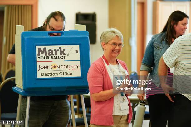 Voters cast their ballots in the Kansas Primary Election at Merriam Christian Church on August 02, 2022 in Merriam, Kansas. Voters in Kansas will...