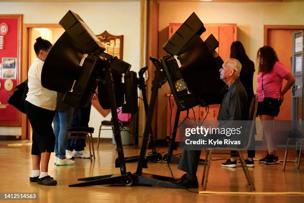 Voters cast their ballots in the Kansas Primary Election at Merriam Christian Church on August 02, 2022 in Merriam, Kansas. Voters in Kansas will...