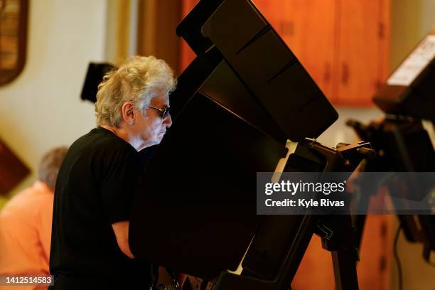 Voter cast their ballot in the Kansas Primary Election at Merriam Christian Church on August 02, 2022 in Merriam, Kansas. Voters in Kansas will...