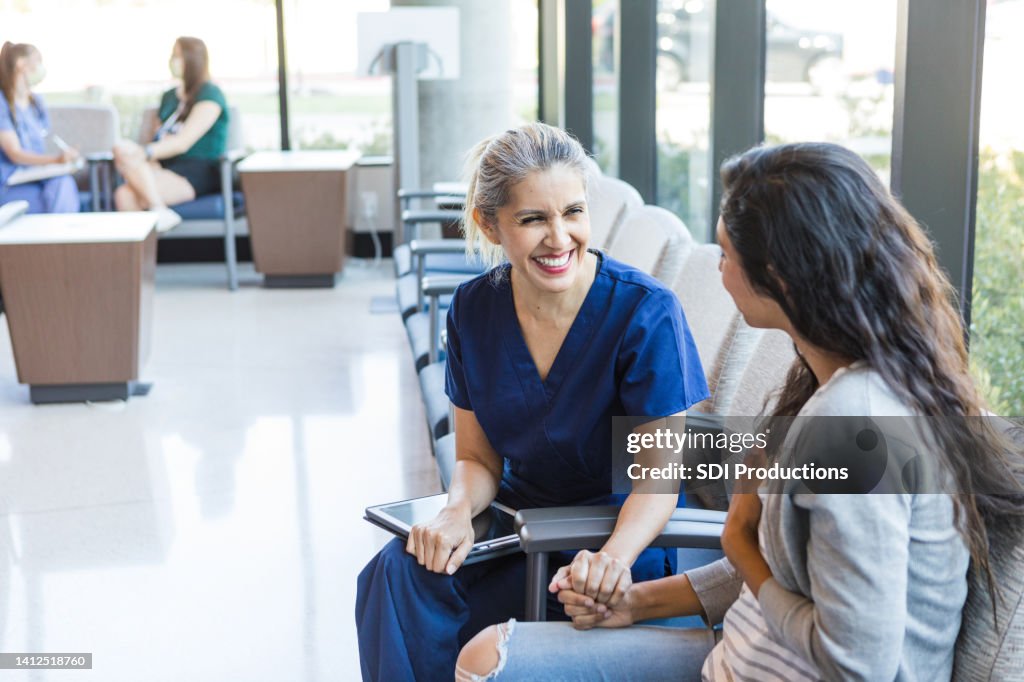 Nurse comforts the patient's family member